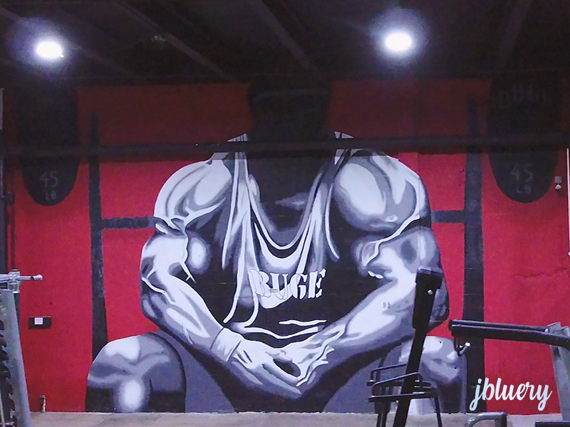 jbluery does mural for Best Used Gym Equipment's massive wall in their showroom!